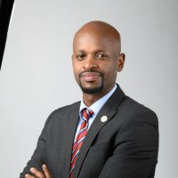Jerry Ntare is a senior executive with 20+ years of cross‑sector experience in banking, investment holding and development finance. He currently serves as Senior Manager, Government Relations & Partnerships at the Agaciro Development Fund, where he leads public‑sector engagement, strategic partnerships and resource mobilization to advance national development priorities. Jerry’s career blends operational leadership, procurement and portfolio analysis with deep financial expertise. At Crystal Ventures Ltd and NPD Ltd he led investment origination, financial modelling, valuation and procurement reform; at KCB and Access Bank he built high‑value client relationships and revenue growth strategies. He is an experienced board representative, advising governance and strategy for portfolio companies and state‑linked entities. A Certified Company Director (London Institute of Directors - IOD) with an Executive Master’s in Financial Services Industry (FICP) from Luxembourg School of Business and a BBA in Finance, Jerry is fluent in English, Kinyarwanda, French and Swahili.